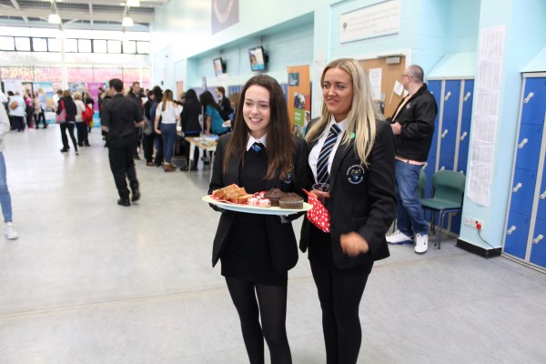 Pupils selling cakes