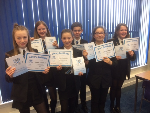 A picture of pupils with certificates